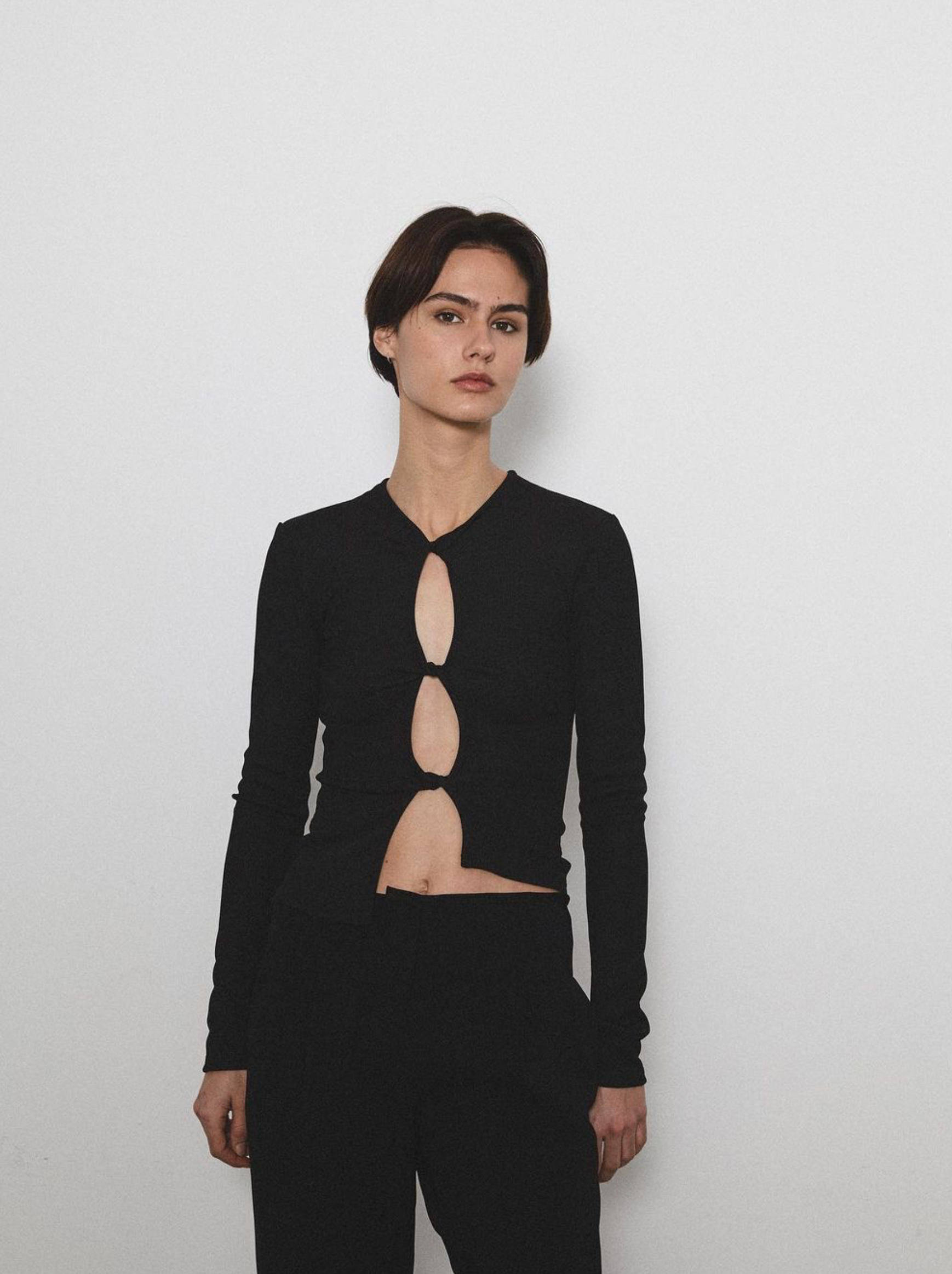 Zara wears the Open Twist Long Sleeve Top, photographed by Sophie