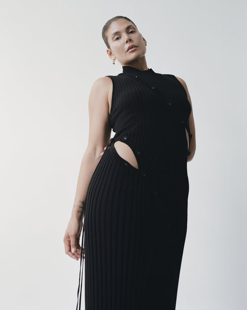 Pala Negara wears the Deconstruct Spiral Knit Dress photographed by Claudia Smith.