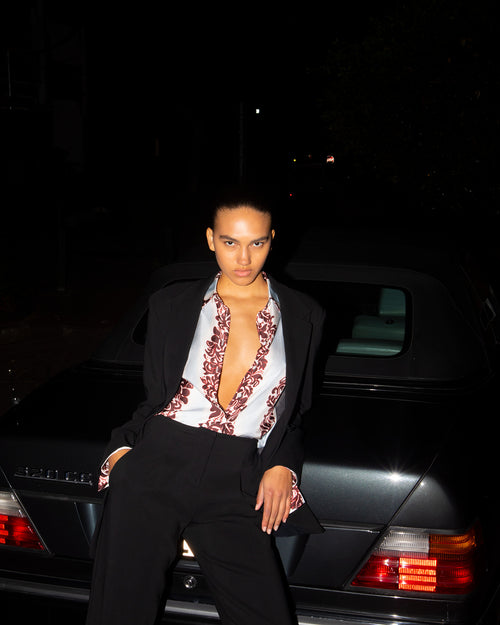 Maya Tuffin wears the Hibiscus Slim Shirt and Redux Contoured Suit photographed by Zac Bayly.