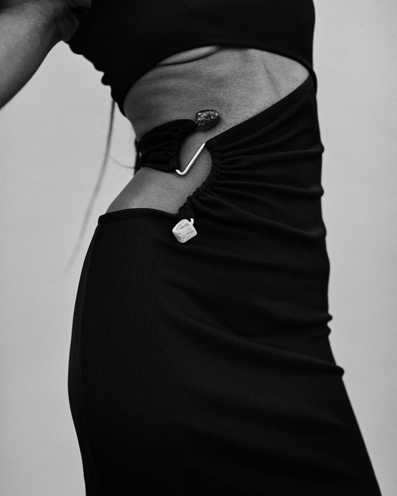 Dazne wears the Elongated Distort Quartz Split Dress